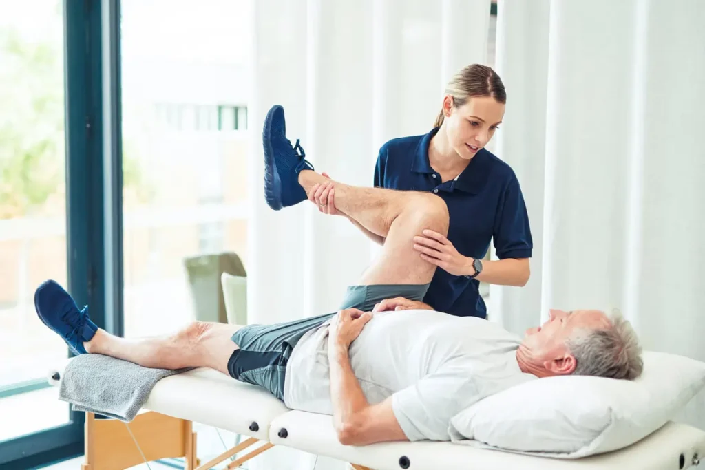 Revitalising Recovery: Effective Rehabilitation Strategies for Muscle Injuries 3 Physiotherapist assisting a patient with muscle recovery exercises Salisbury