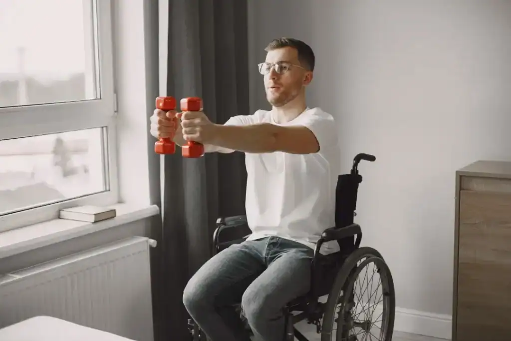 Empowering Weight Loss: A Comprehensive Guide for Individuals with Disabilities 1 Image of man doing exercise in his wheelchair to aid weight loss Salisbury