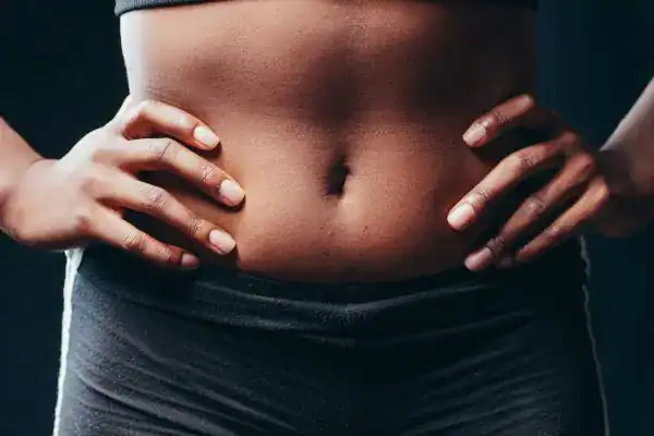 Toning Your Stomach: The Ultimate Guide to Achieving a Sculpted Stomach While Shedding Pounds 1 Image of a toned stomach after non surgical treatment Salisbury